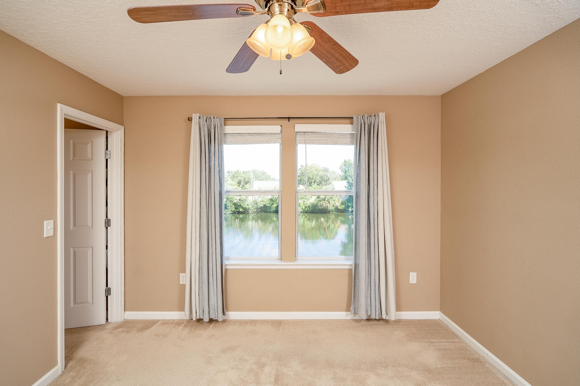 183 Islander Drive St. Augustine, FL 32080 - Photo 25 of 36 a view of entryway with a chandelier