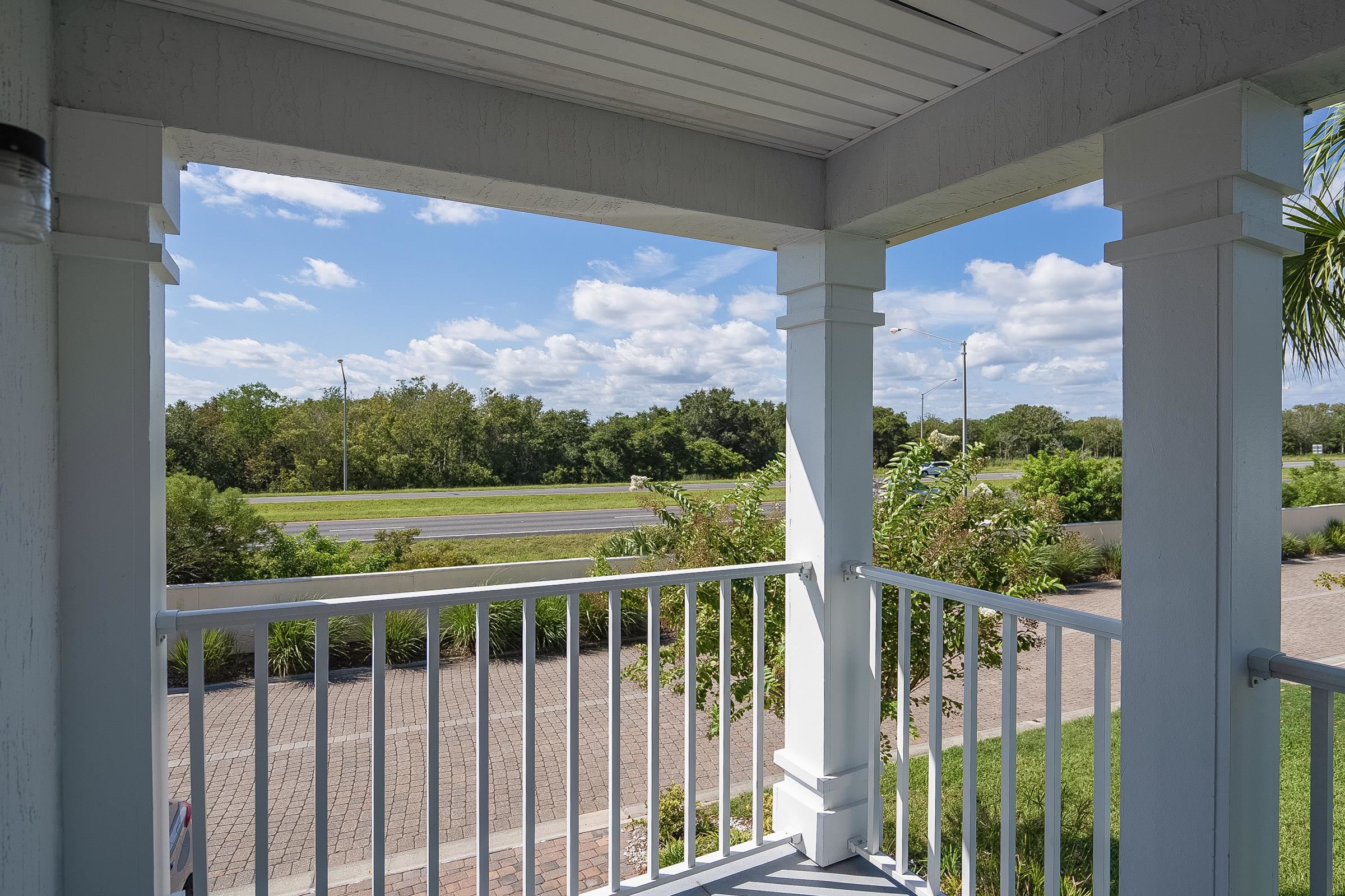 183 Islander Drive St. Augustine, FL 32080 - Photo 31 of 36 a view of a city from a balcony