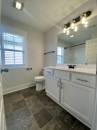 a bathroom with a shower and a bathtub