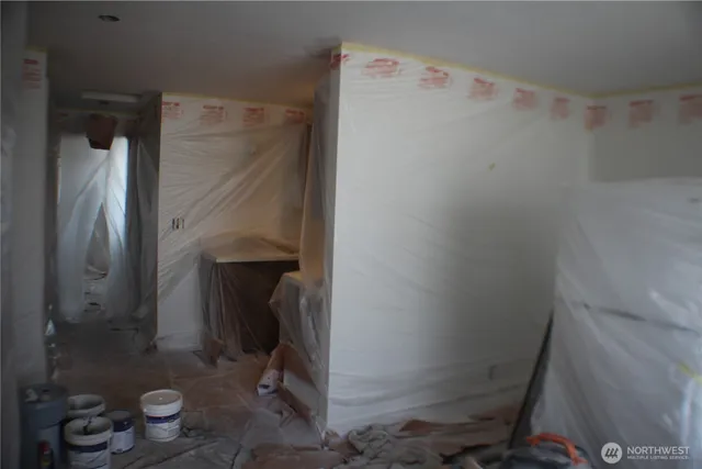 a bathroom with a shower and a toilet