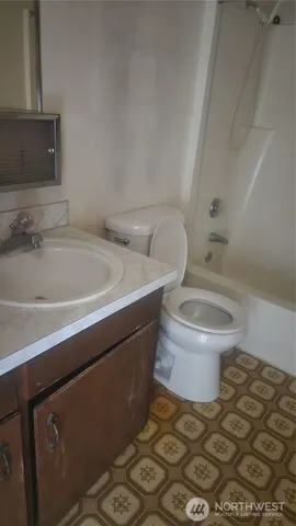 a bathroom with a sink and a toilet