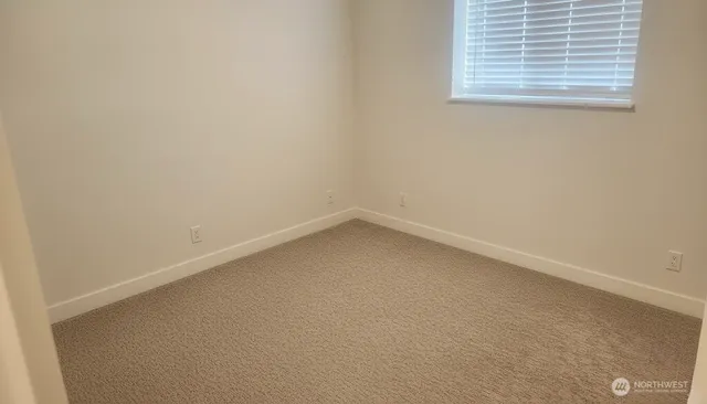 a view of a small space with a window