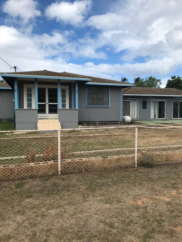 7980 Ulili Road Kekaha, HI 96752 - Photo 1 of 1 a front view of a house with a yard