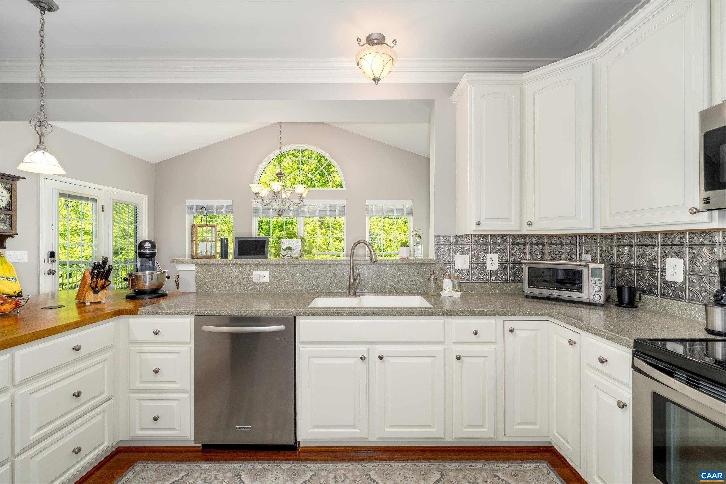 5366 Park Road Crozet, VA 22932 - Photo 25 of 61 a kitchen with white cabinets and window
