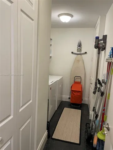 a room with furniture and a window