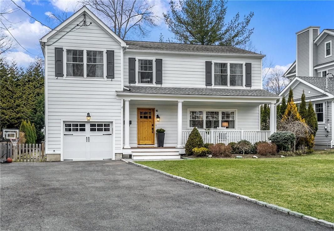 16 Bennett Street Rye, NY 10580 - Photo 1 of 1 a front view of a house with a yard