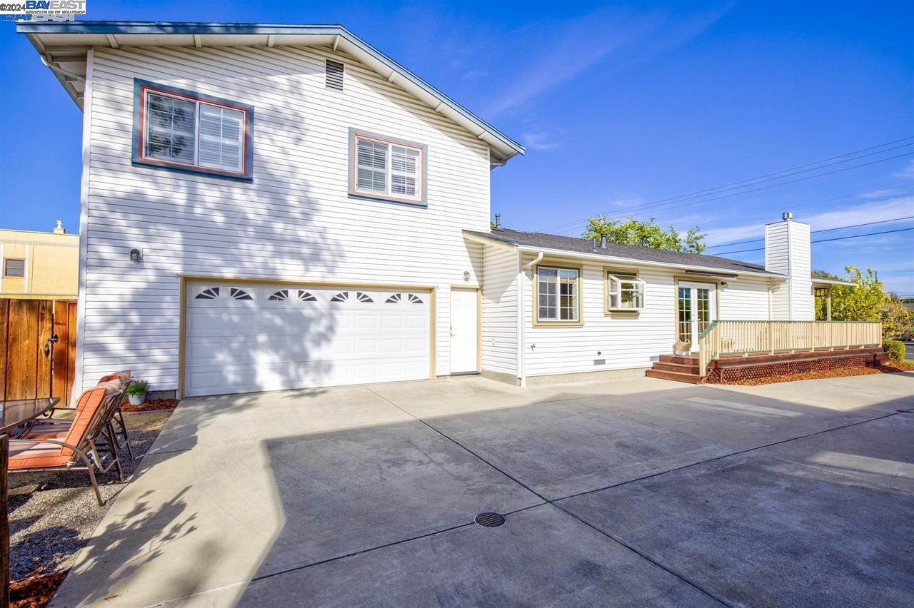1746 3rd Street, Unit B Livermore, CA 94550 - Photo 2 of 12 a backyard of a house with yard and outdoor seating