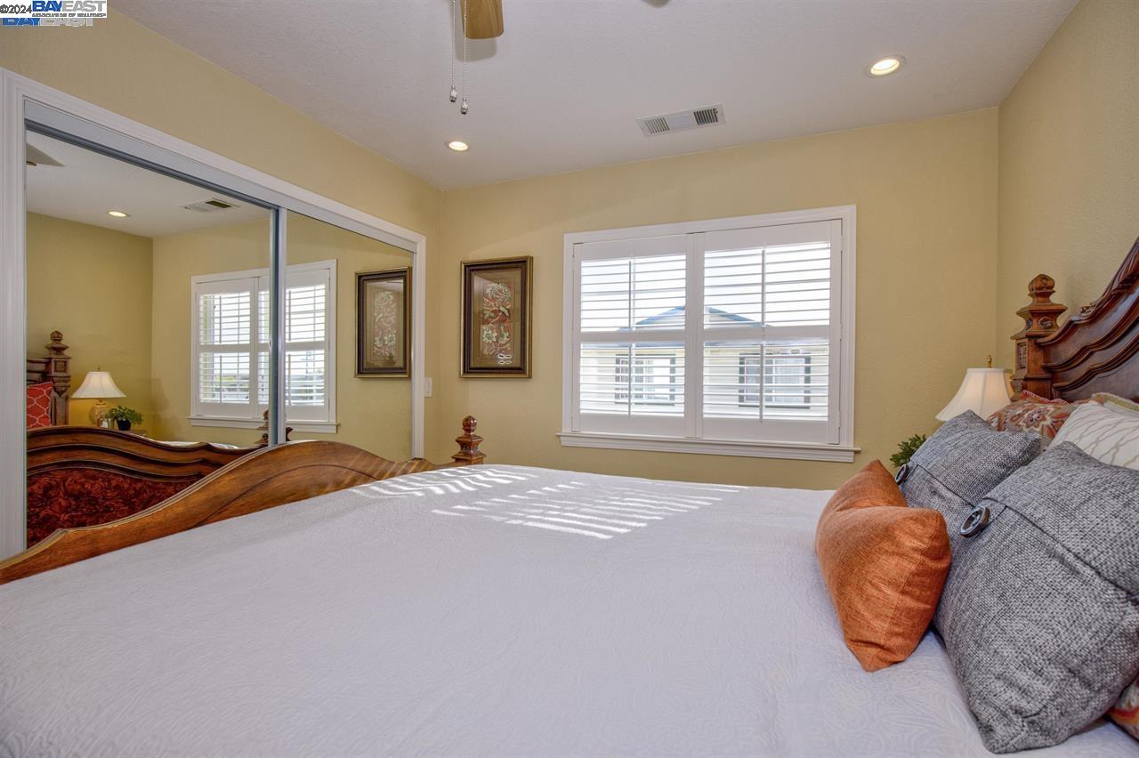 1746 3rd Street, Unit B Livermore, CA 94550 - Photo 8 of 12 a bedroom with a bed and window
