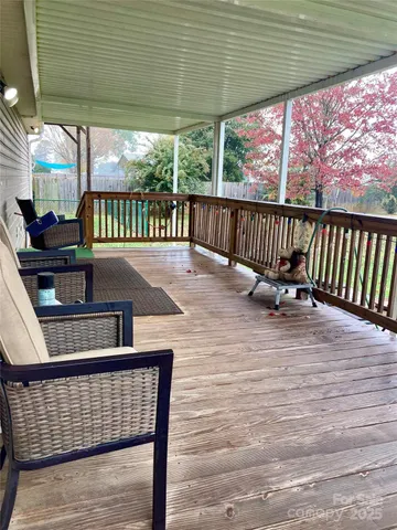 a view of balcony with furniture