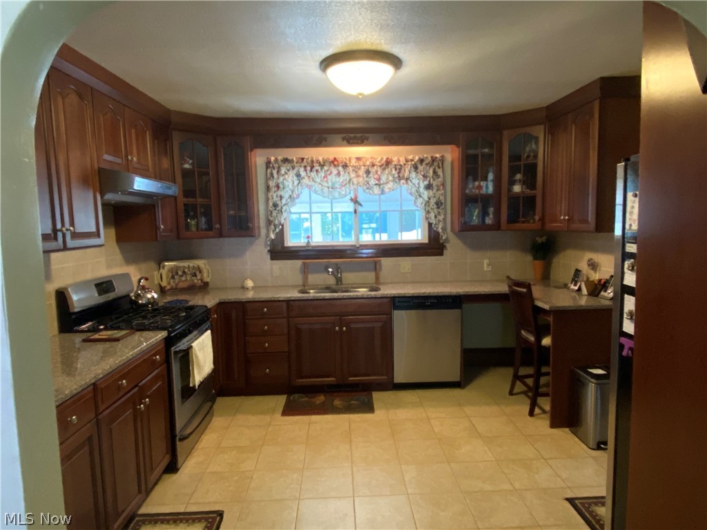 97 Canton Road Akron, OH 44312 - Photo 15 of 25 Updated kitchen with granite, stainless steel appliances