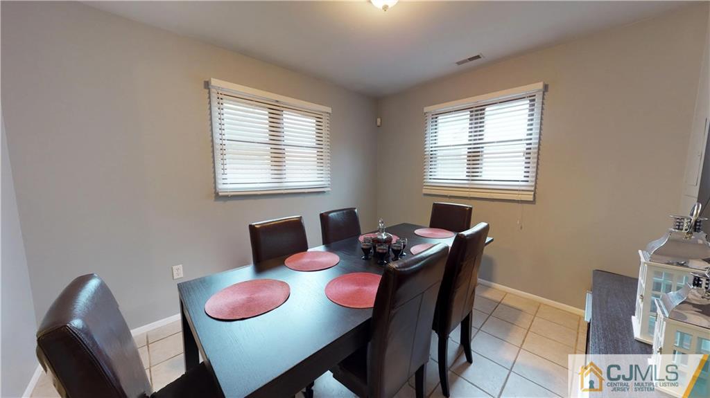 41 Idlewild Road Edison, NJ 08817 - Photo 14 of 23 a dining room with furniture and window