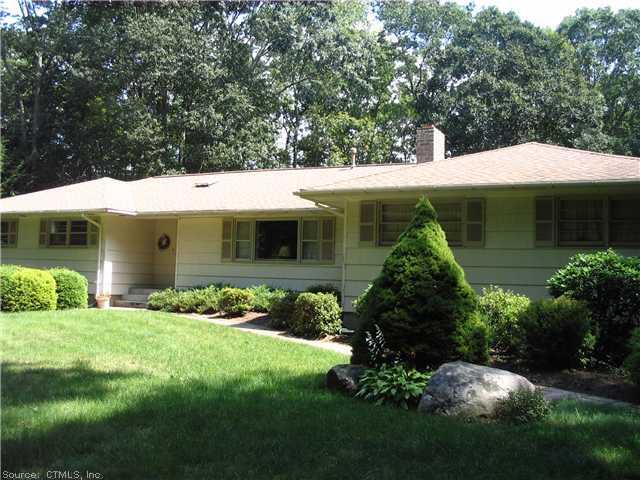 a view of a house with a garden