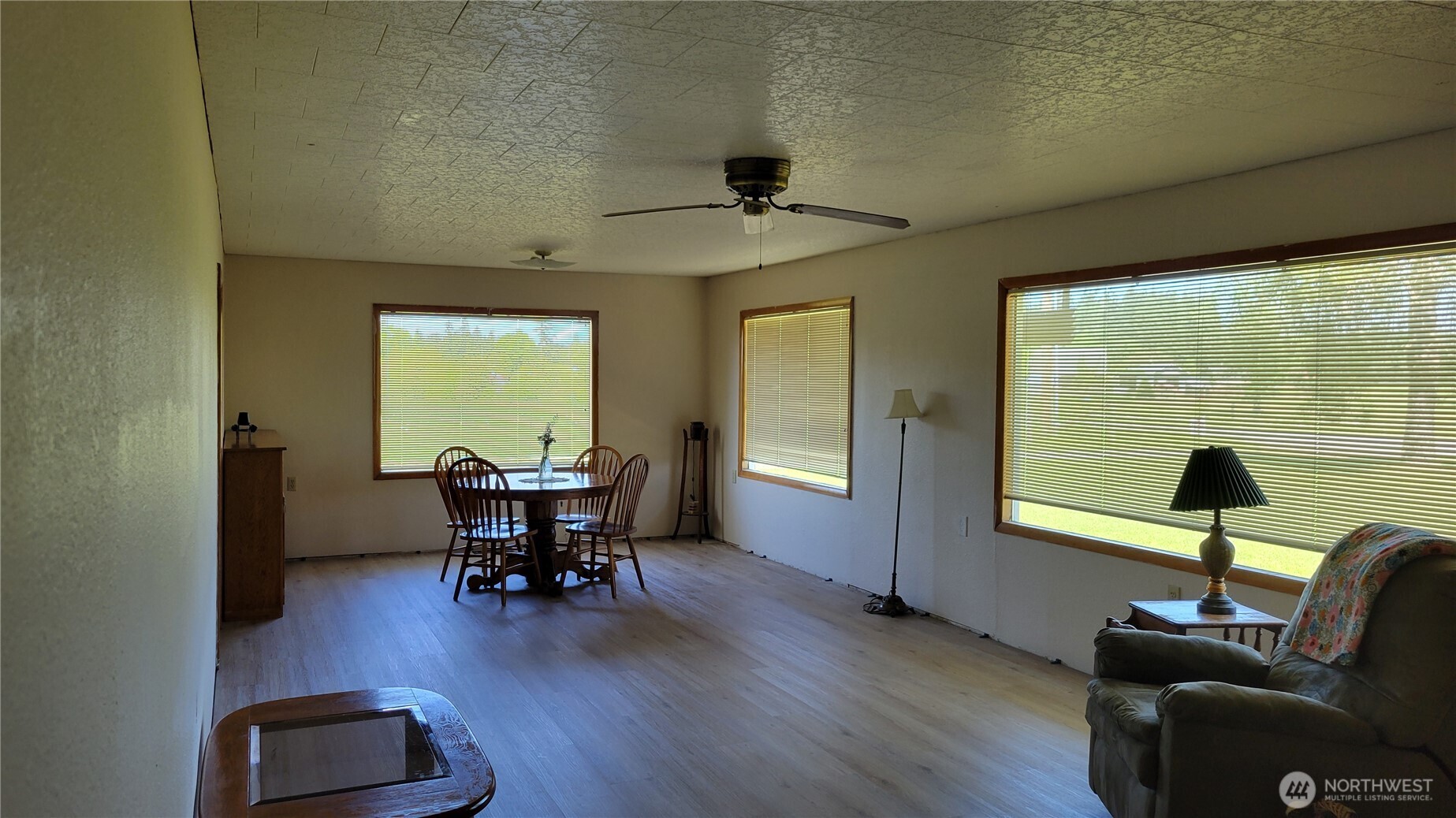 1296 Highway 12 Chehalis, WA 98532 - Photo 2 of 33 a dining room with furniture window wooden floor