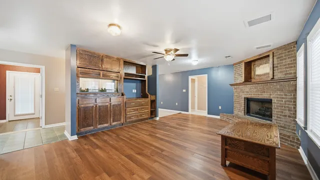 a view of a kitchen with furniture and a kitchen