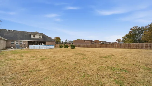 a view of a lake with a big yard