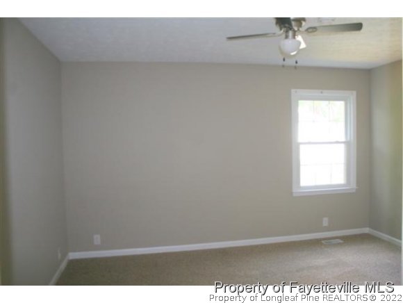 5212 Rockingham Road Fayetteville, NC 28311 - Photo 9 of 19 a view of an empty room