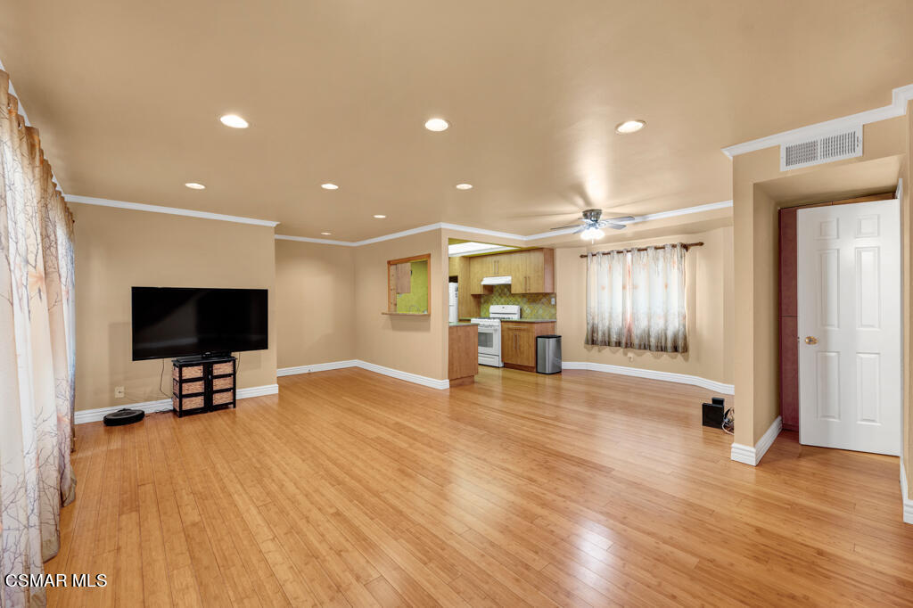 10240 Silverton Avenue, Unit 9 Tujunga, CA 91042 - Photo 11 of 23 a view of a livingroom with a flat screen tv