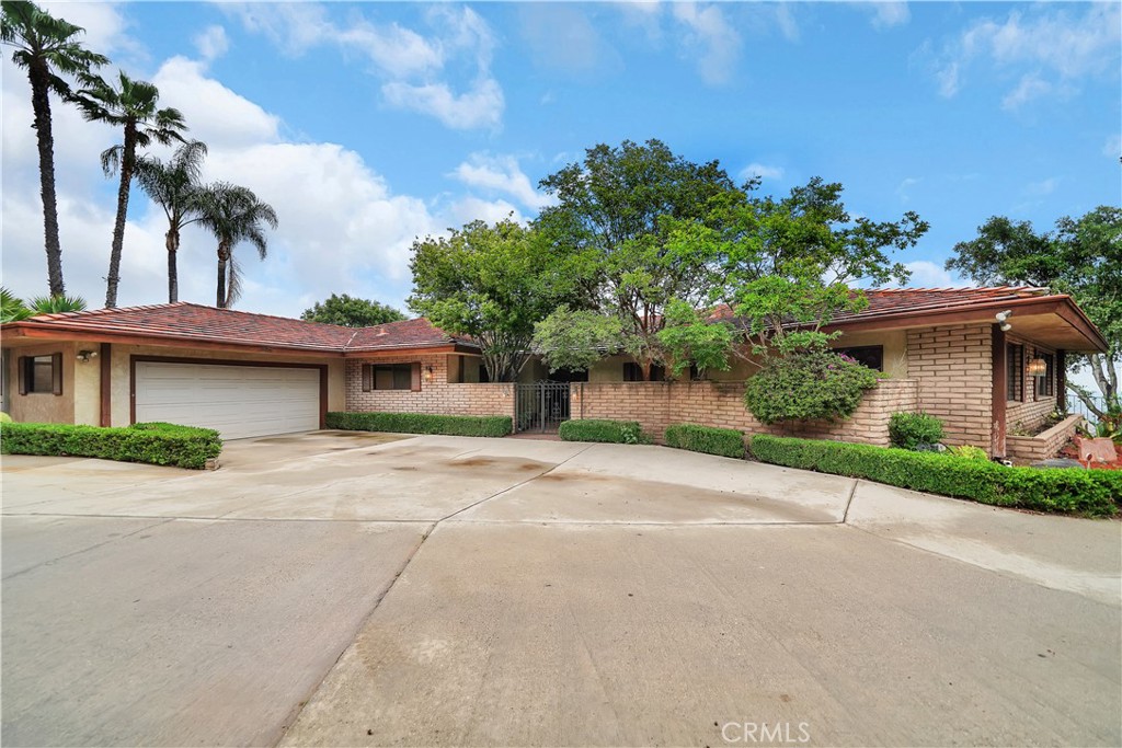 front view of a house with a street