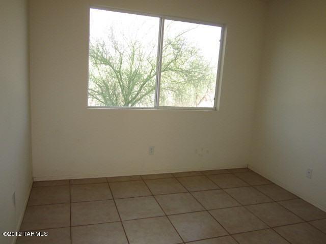 70 Círculo Cortez Rio Rico, AZ 85648 - Photo 11 of 13 an empty room with a window
