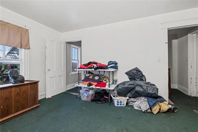 a play room with furniture and toys