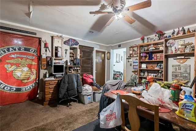 a room with furniture and musical instruments