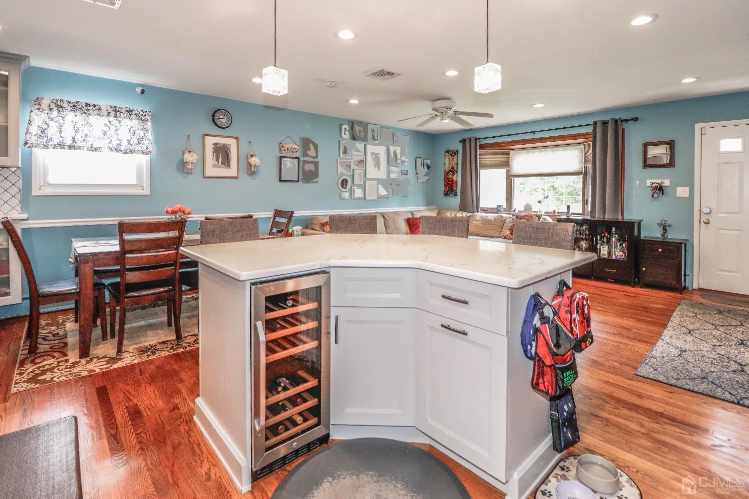 24 Finley Road Edison, NJ 08817 - Photo 12 of 27 a view of kitchen with stainless steel appliances granite countertop sink stove and wooden floor