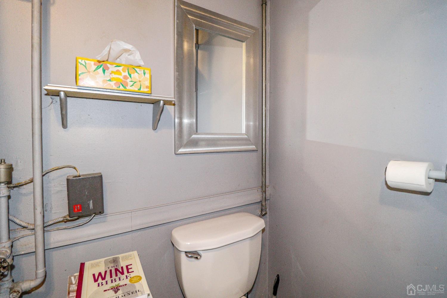 24 Finley Road Edison, NJ 08817 - Photo 16 of 27 a bathroom with a toilet and a sink