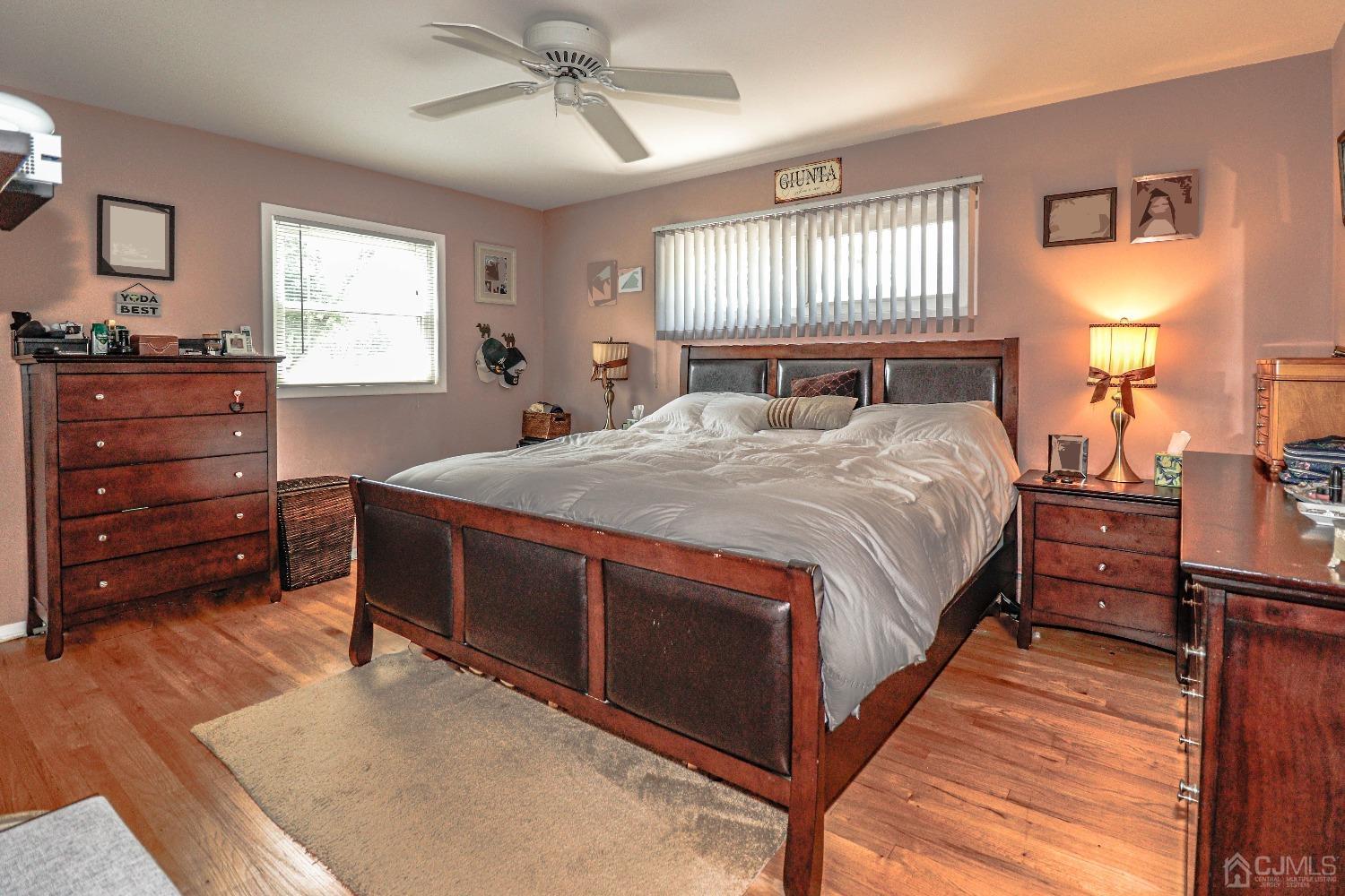 24 Finley Road Edison, NJ 08817 - Photo 17 of 27 a bed room with a bed and a window