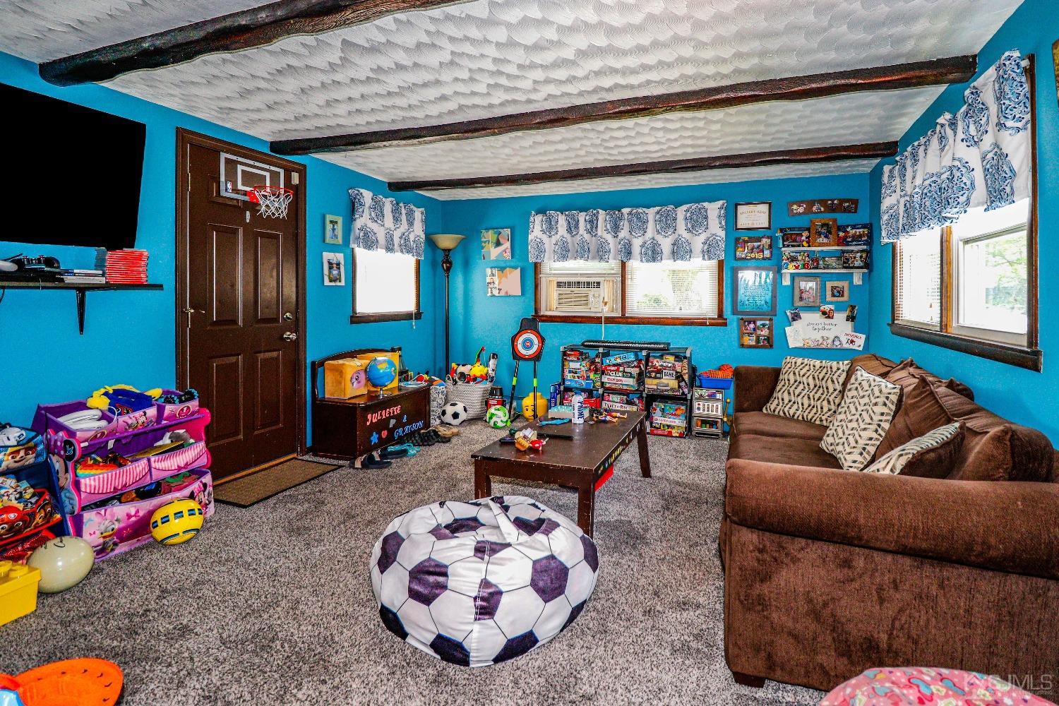 24 Finley Road Edison, NJ 08817 - Photo 23 of 27 a living room with lots of furniture and a couch