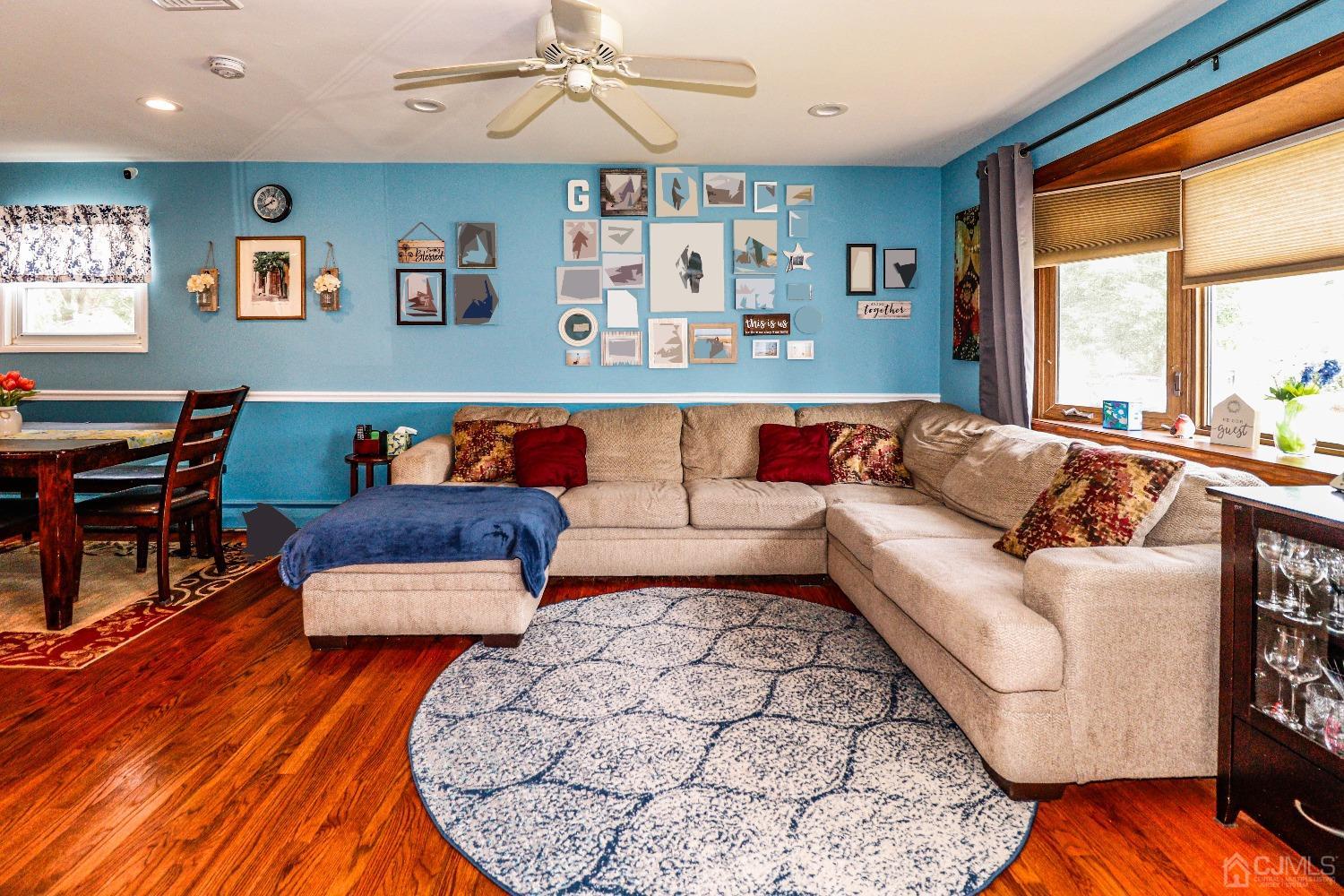 24 Finley Road Edison, NJ 08817 - Photo 6 of 27 a living room with furniture and a large window
