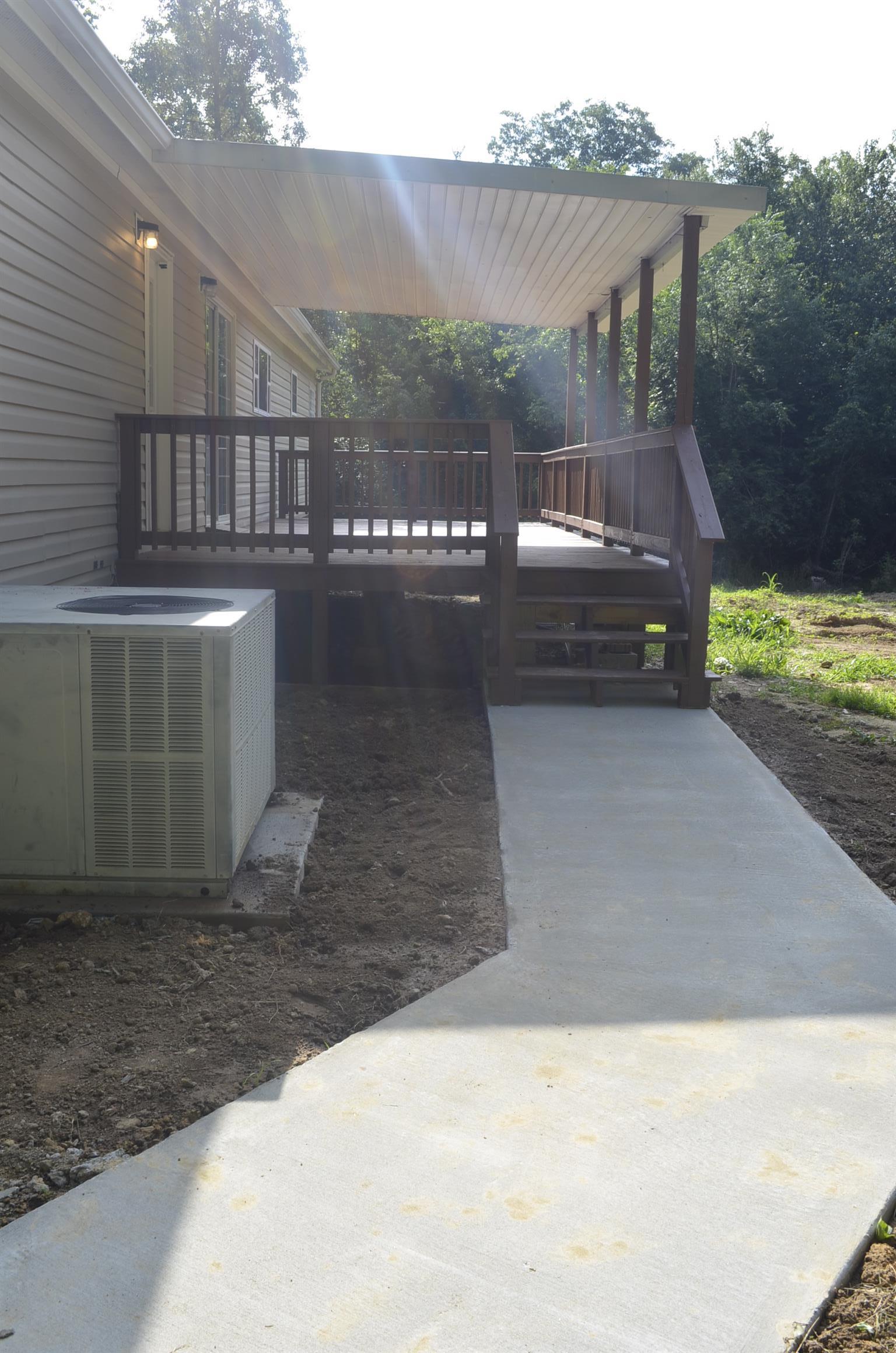 3977 Deans Shop Road Estill Springs, TN 37330 - Photo 25 of 26 CONCRETE SIDEWALK TO BACK DECK