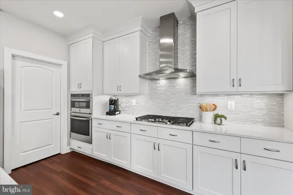 a bedroom with double bed and a window