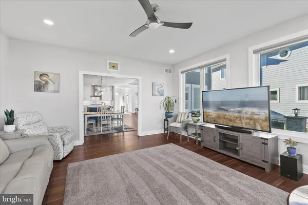 a bedroom with a bed and a chair