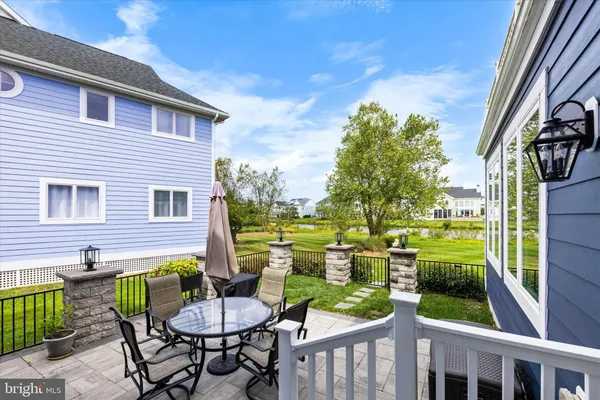 an aerial view of a swimming pool patio swimming pool and outdoor seating