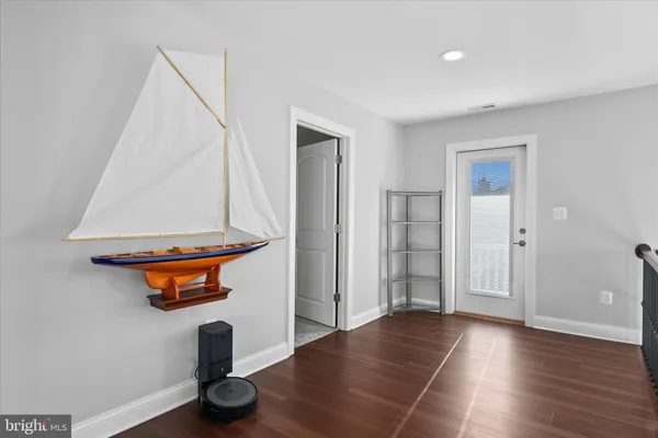 a outdoor view with a sitting space and garden