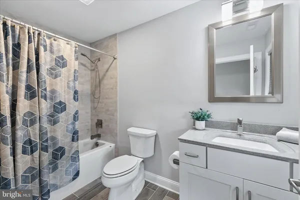 a view of swimming pool with a lounge chair