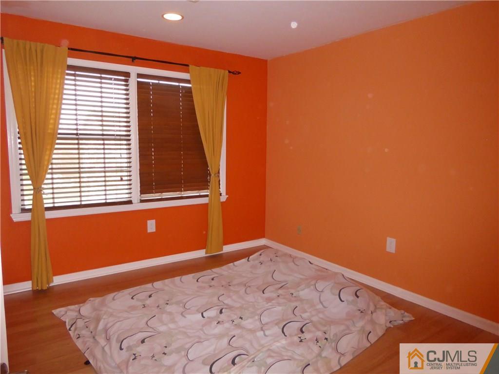 334 Edpas Road, Unit 334 New Brunswick, NJ 08901 - Photo 10 of 19 an empty room with a window