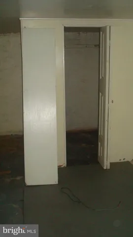 a view of a hallway with staircase