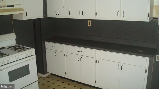 a view of cabinets with wooden door