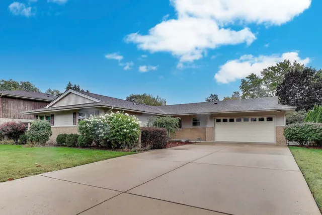 a house view with a garden space