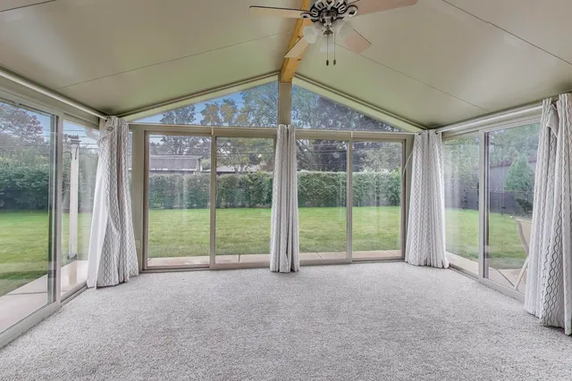 a view of a room with window and a big room