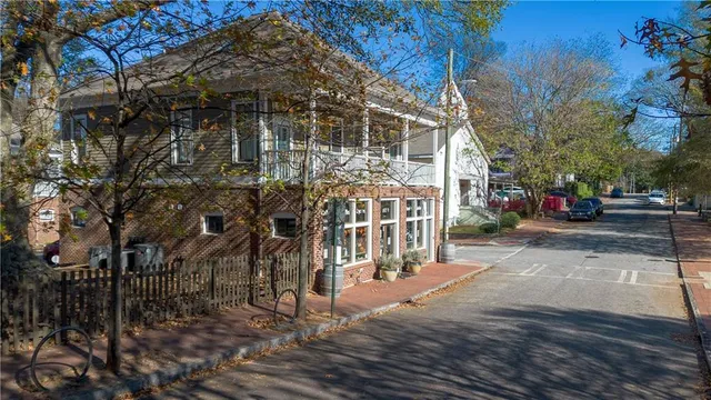 a view of a building with a street