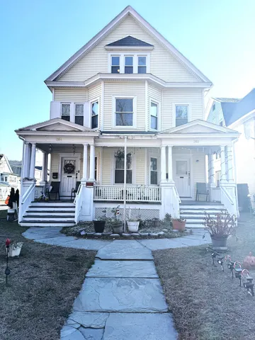 a front view of a house with a porch