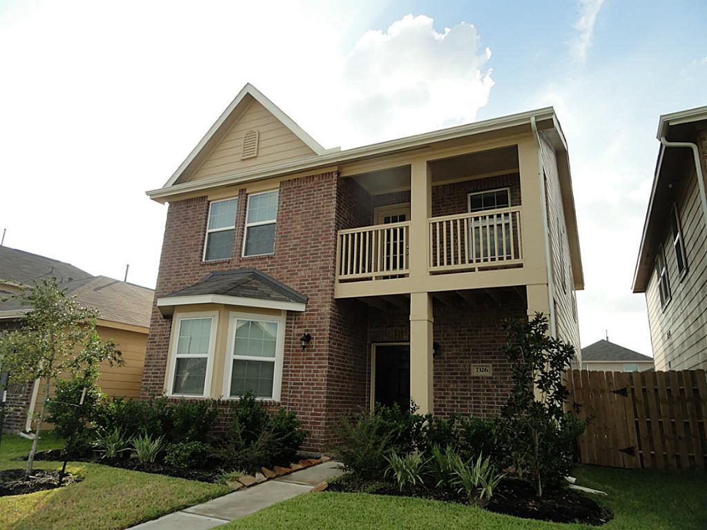 7326 Granite Terrace Lane Houston, TX 77083 - Photo 1 of 39 a front view of house with yard and green space