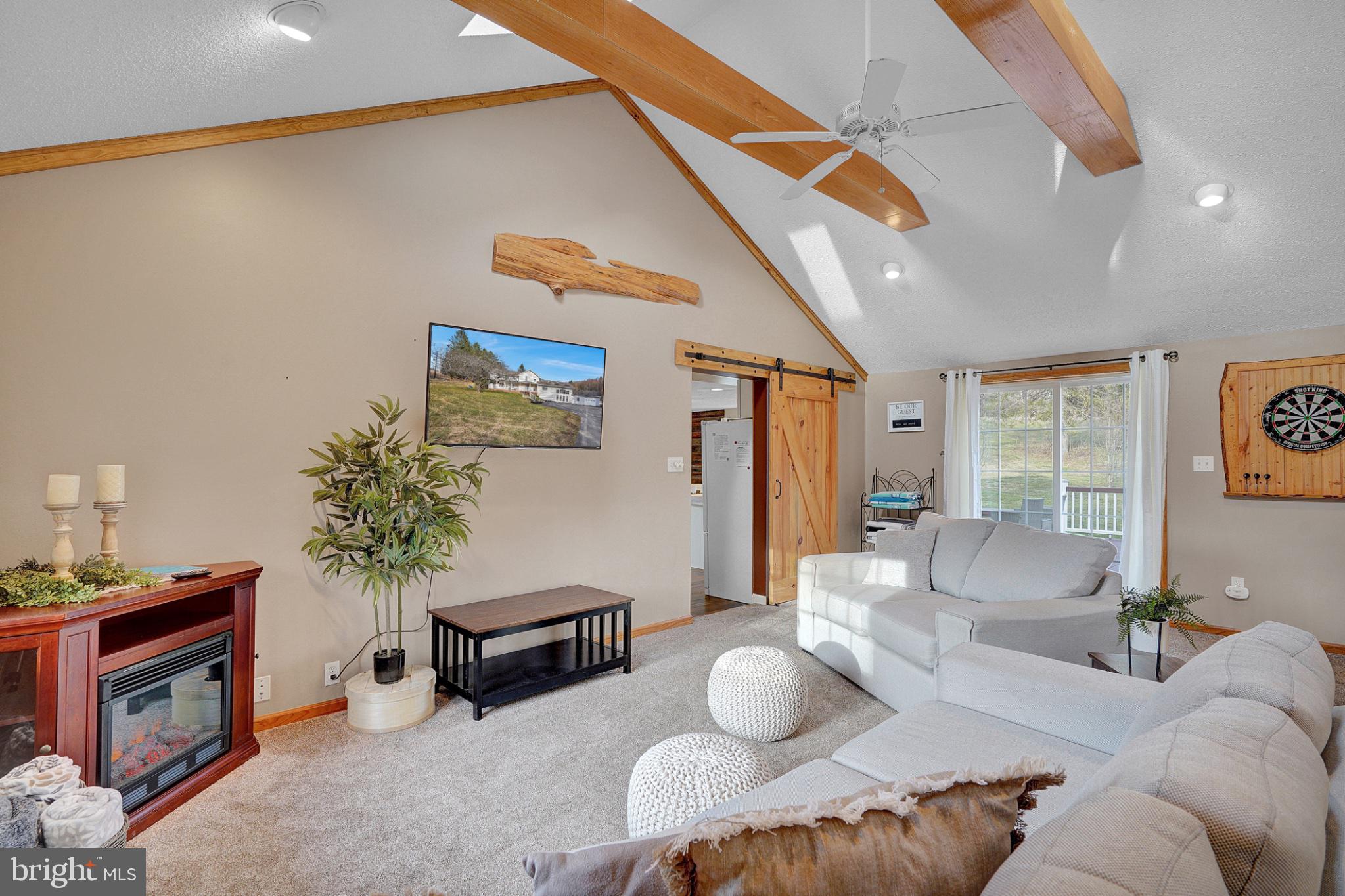 259 A A-Frame Road Coudersport, PA 16915 - Photo 24 of 130 Cozy living space with vaulted ceilings.