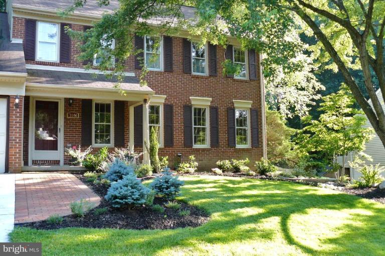 7644 Chancellor Way Springfield, VA 22153 - Photo 28 of 29 front view of a house with a yard