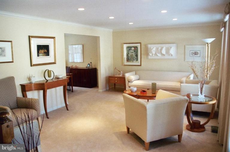 a living room with furniture and a couch