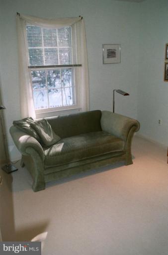 7644 Chancellor Way Springfield, VA 22153 - Photo 18 of 29 a living room with furniture and window