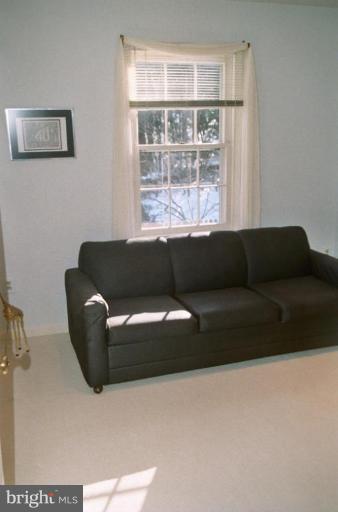 7644 Chancellor Way Springfield, VA 22153 - Photo 19 of 29 a living room with furniture and a window