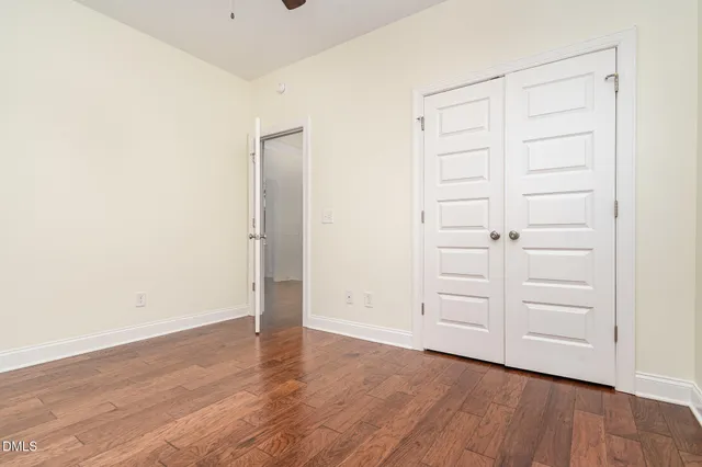 a view of empty room with windows